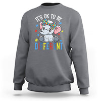 Gray autism awareness sweatshirt with elephant “It's OK to be Different” graphic