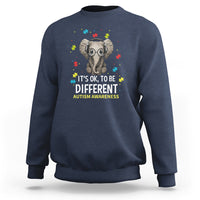 Navy sweatshirt with autism elephant graphic and "It's OK, to be Different" text