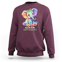 Maroon autism awareness sweatshirt with rainbow elephant and flower graphic
