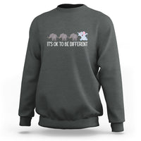 Charcoal crewneck sweatshirt with elephant graphic and “It’s OK to be different” text