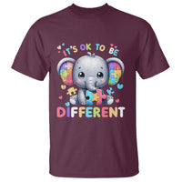Dark maroon T-shirt with cute elephant puzzle graphic and message “It’s OK to be Different”
