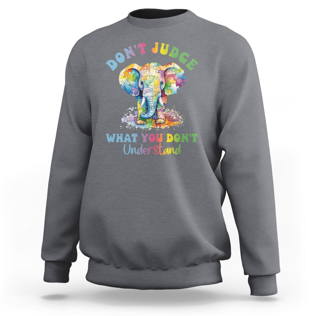 Charcoal heather sweatshirt with colorful elephant graphic and slogan 'DON'T JUDGE' on back.