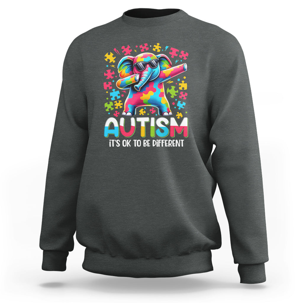 Charcoal gray sweatshirt with rainbow dabbing elephant autism awareness graphic on front
