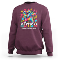 Maroon sweatshirt with rainbow dabbing elephant autism awareness graphic on front