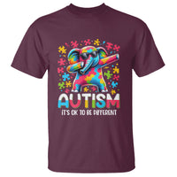 Maroon autism graphic T-shirt with dabbing elephant and “AUTISM” text