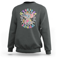 Charcoal gray crewneck sweatshirt with colorful elephant “It’s Okay To Be Different” graphic