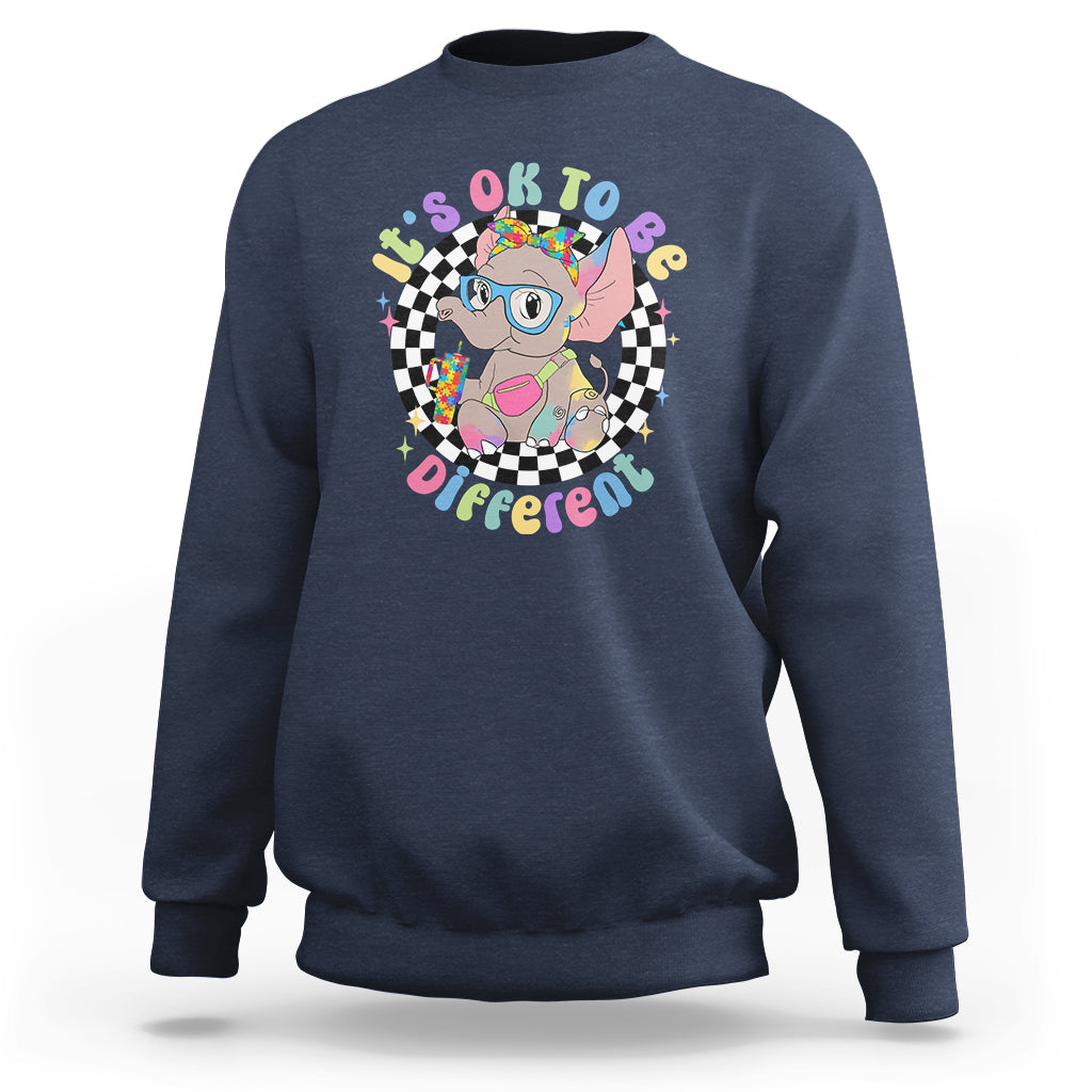 Navy crewneck sweatshirt with colorful elephant “It’s Okay To Be Different” graphic