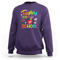 Purple crewneck sweatshirt with colorful “Happy First Day of School” graphic on chest
