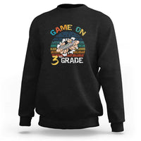 Black sweatshirt with “GAME ON” and “3RD GRADE” gamer graphic on chest