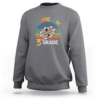Gray sweatshirt with “GAME ON” and “3RD GRADE” gamer graphic on chest