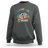 Charcoal sweatshirt with “GAME ON” and “3RD GRADE” gamer graphic on chest