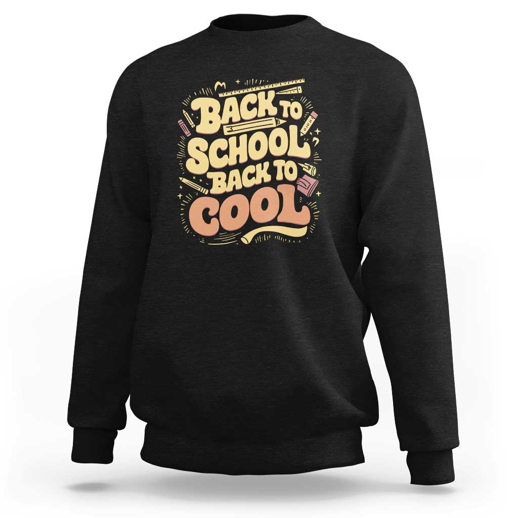 Back-to-school sweatshirt in black with 'Back to School Back to Cool' back graphic