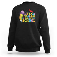 Black crewneck sweatshirt with colorful back-to-school graphic on the chest
