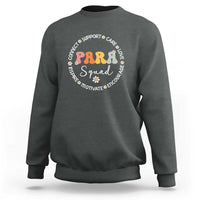 Dark heather gray crewneck sweatshirt with colorful “PARA Squad” circular graphic on chest