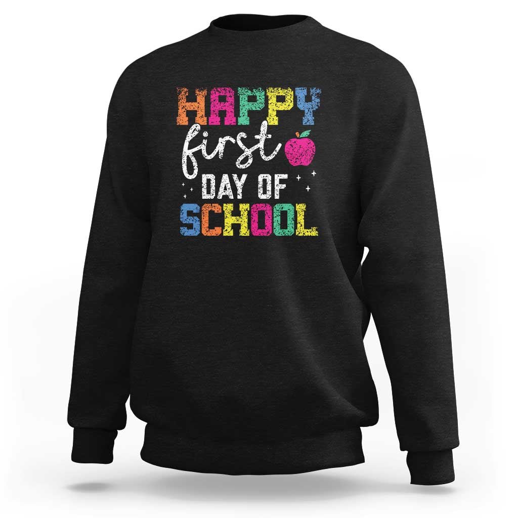 Black sweatshirt with “Happy First Day of School” colorful text graphic on front