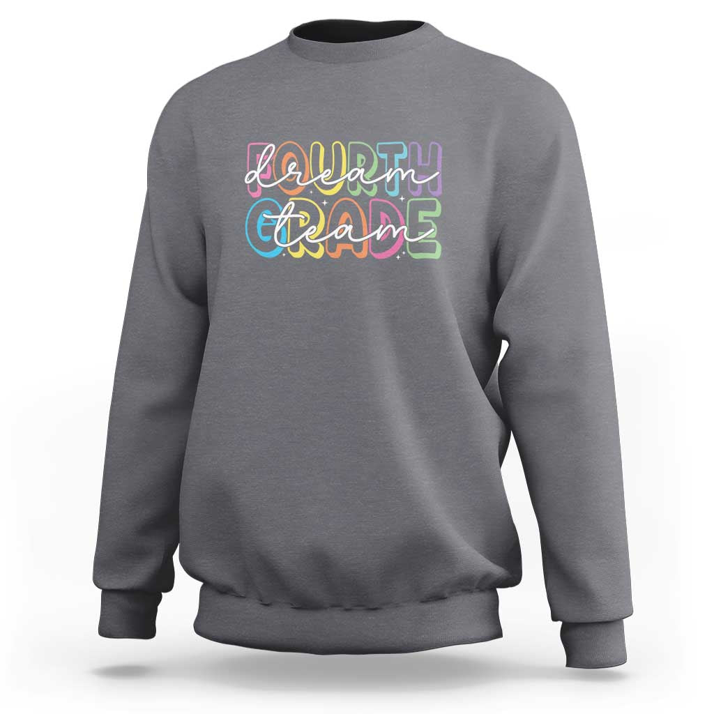 Charcoal sweatshirt with “Dream Team” graphic, crew neck and long sleeves