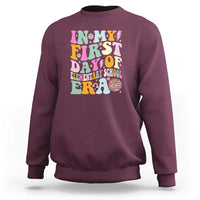 Kids graphic sweatshirt, maroon with colorful “First Day of Elementary” design on chest