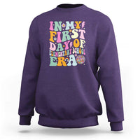 Kids graphic sweatshirt, purple with colorful “First Day of Elementary” design on chest
