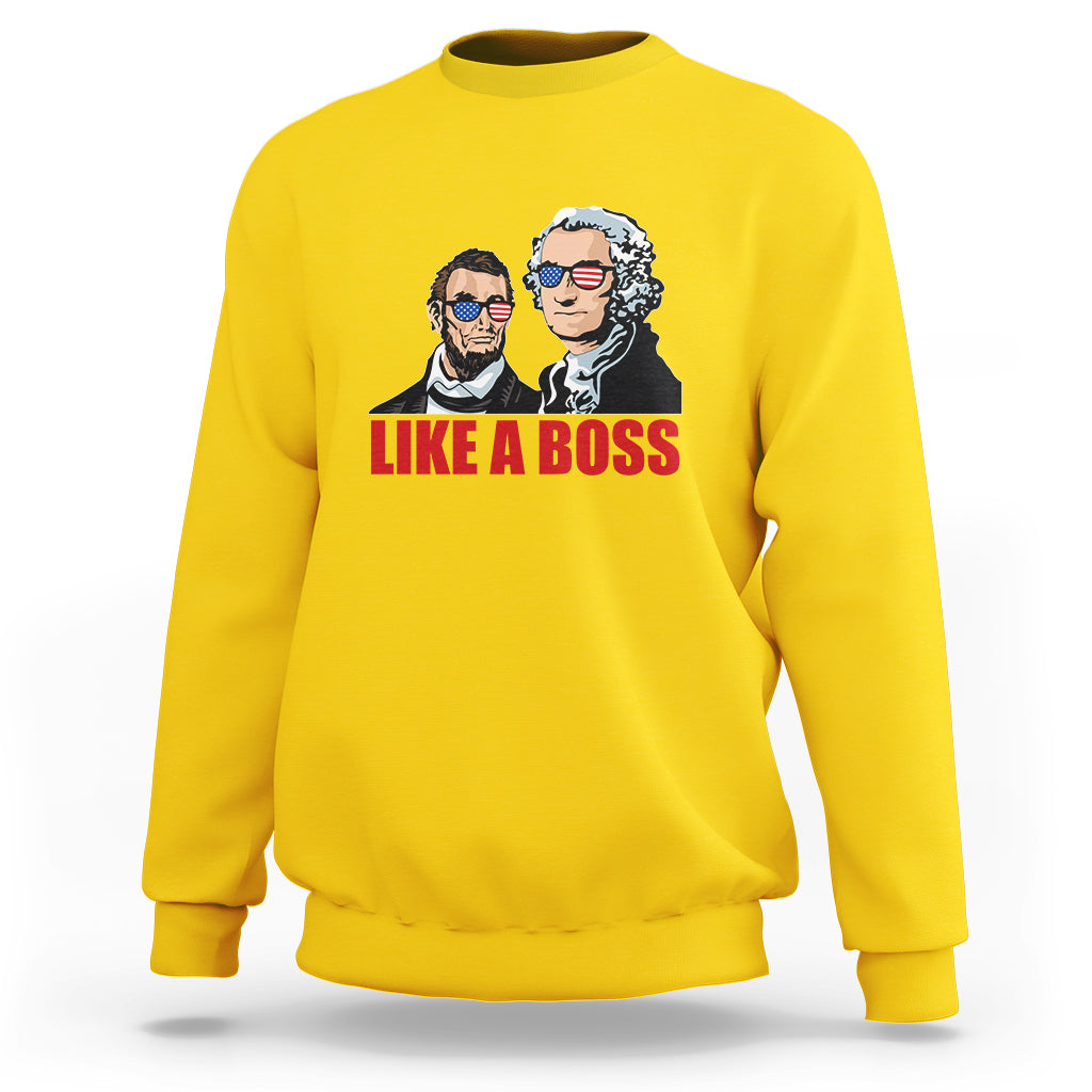Daisy yellow sweatshirt with "LIKE A BOSS" graphic of two presidents