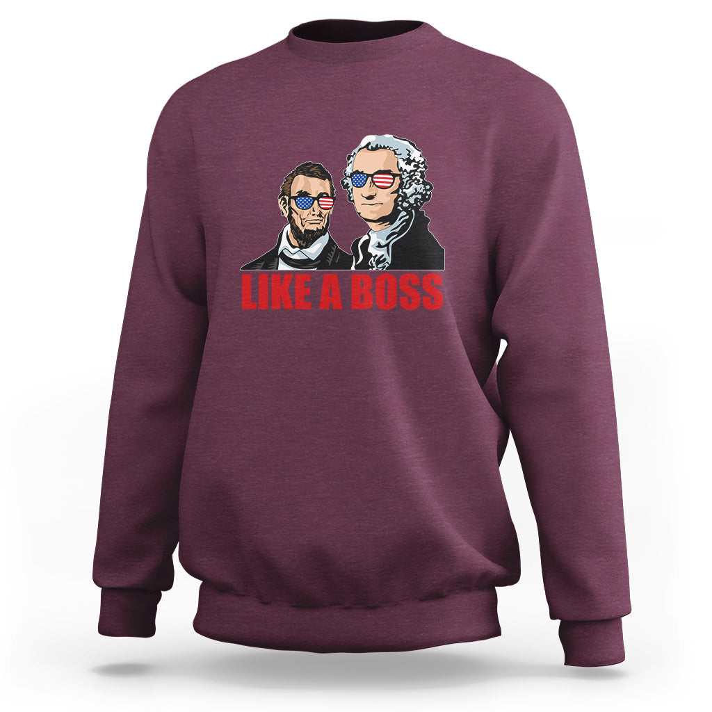 Maroon sweatshirt with "LIKE A BOSS" graphic of two presidents
