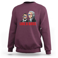 Maroon sweatshirt with "LIKE A BOSS" graphic of two presidents