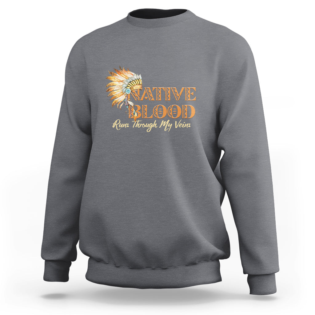 Charcoal crewneck sweatshirt with Native Blood feather graphic on the front