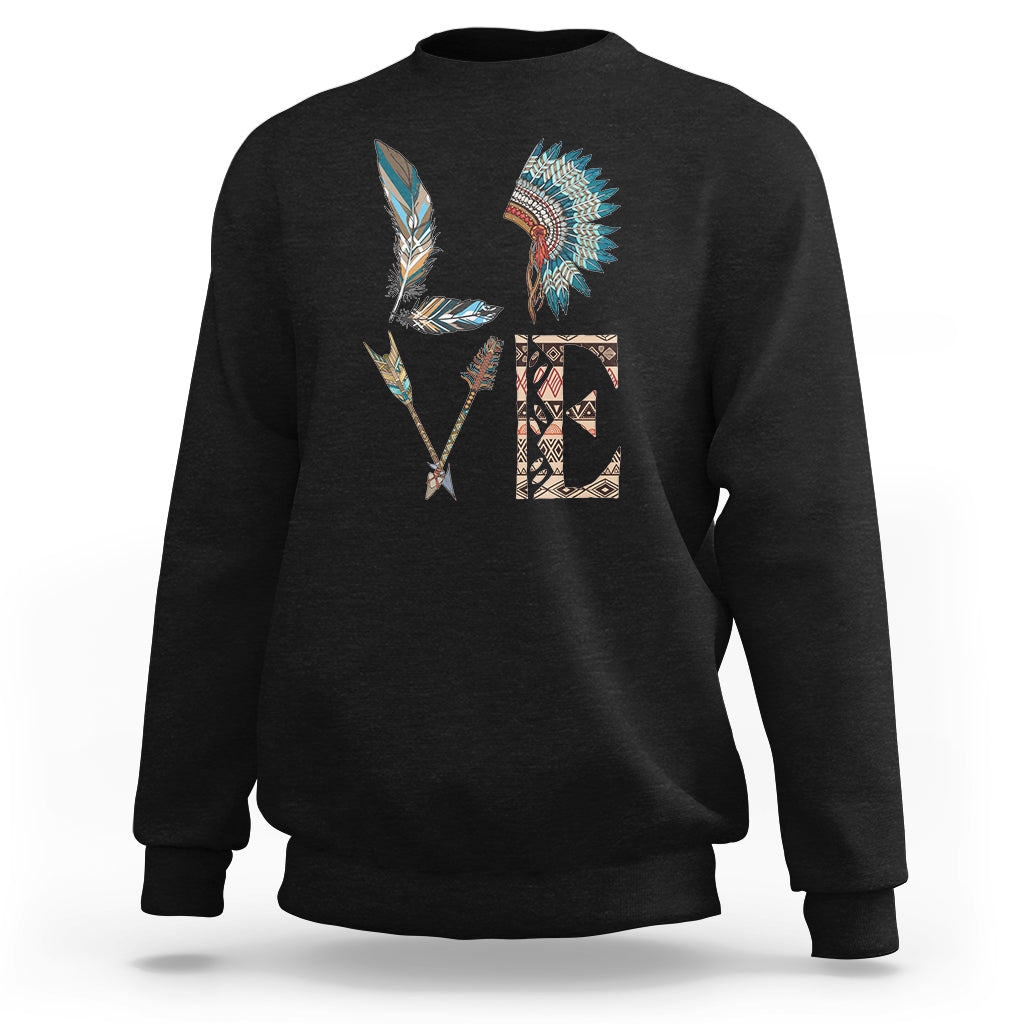 Native American sweatshirt in black with colorful feather tribal graphic on back