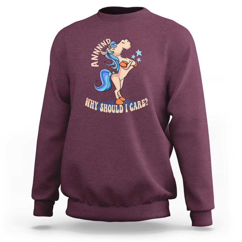 Maroon unicorn graphic sweatshirt with slogan “Why Should I Care?”