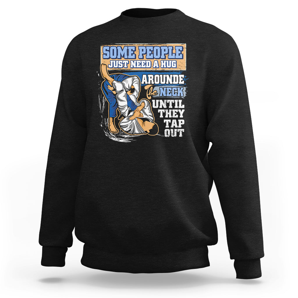 Black Brazilian Jiu Jitsu MMA sweatshirt with colorful back quote and grappling graphic.