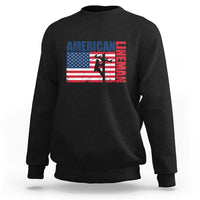 Black crewneck sweatshirt with American flag lineman graphic on the front