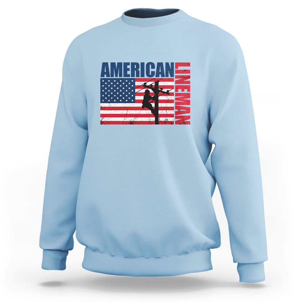 Light blue crewneck sweatshirt with American flag lineman graphic on the front