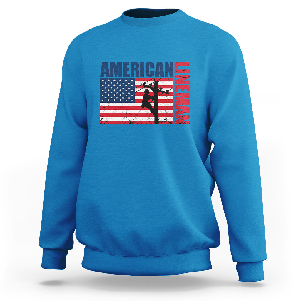 Blue crewneck sweatshirt with American flag lineman graphic on the front