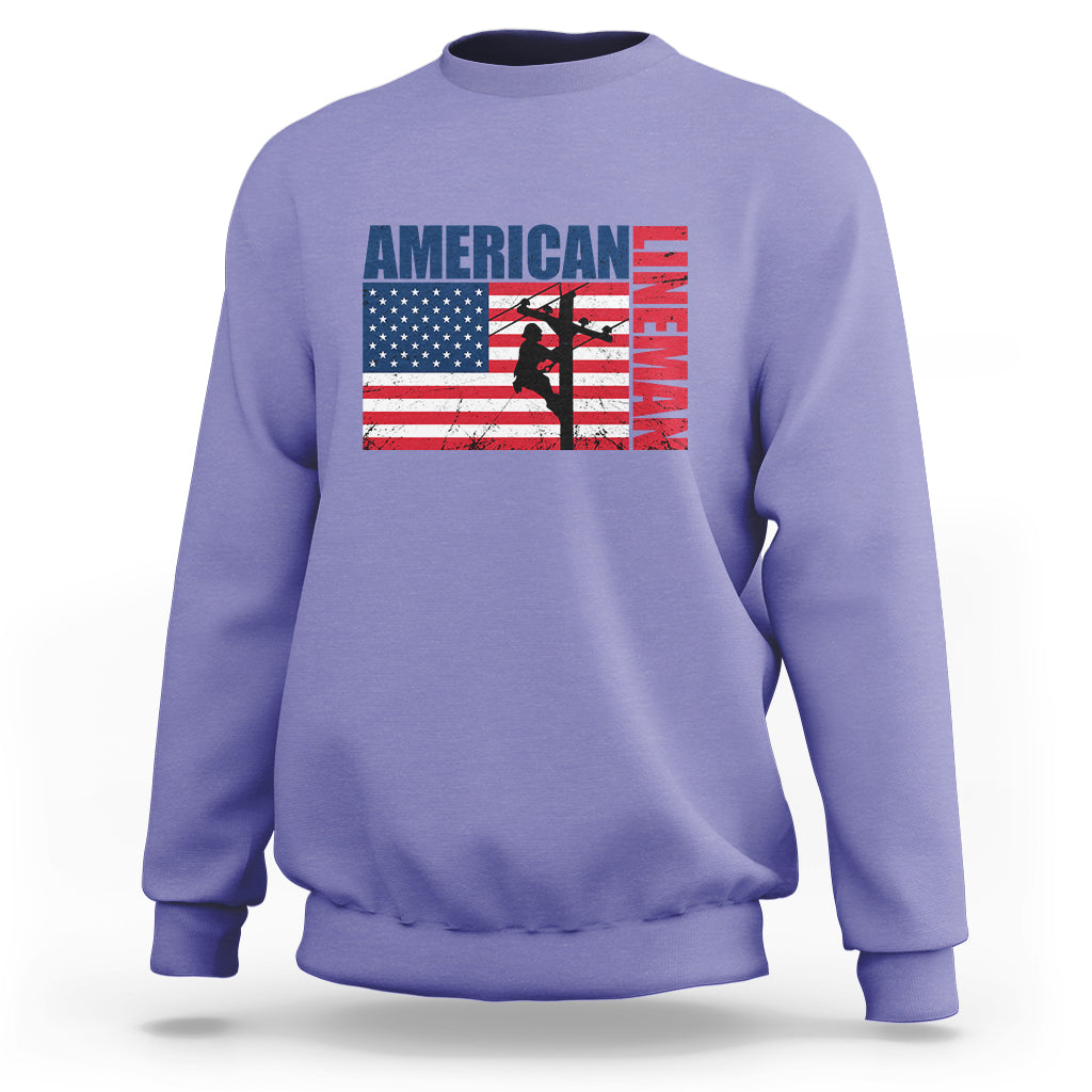 Violet crewneck sweatshirt with American flag lineman graphic on the front