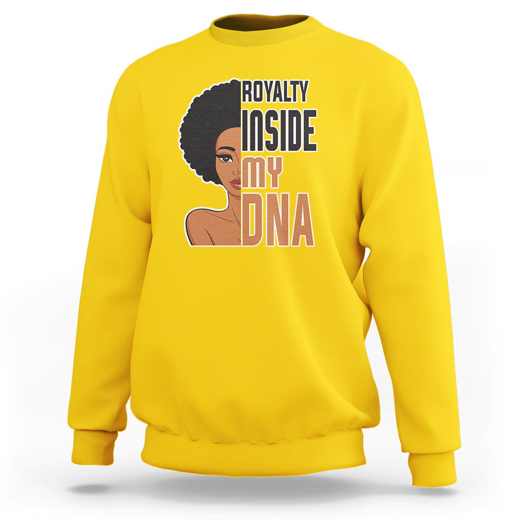 Women’s yellow crewneck sweatshirt with 'Royalty Inside My DNA' front graphic