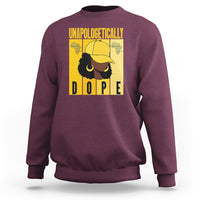 Maroon sweatshirt with yellow “UNAPOLOGETICALLY DOPE” front graphic