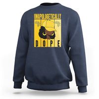 Navy blue sweatshirt with yellow “UNAPOLOGETICALLY DOPE” front graphic