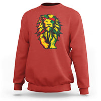Red crewneck sweatshirt with multicolor lion graphic on the chest