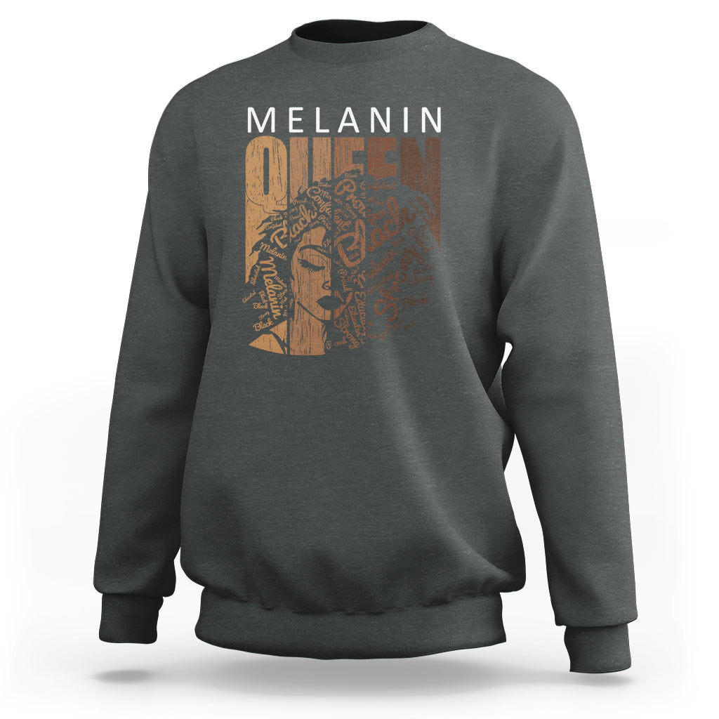 Charcoal gray crewneck sweatshirt with front graphic and long sleeves