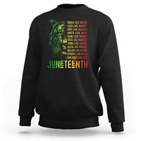 Juneteenth sweatshirt in black with green lion graphic and “Juneteenth” text