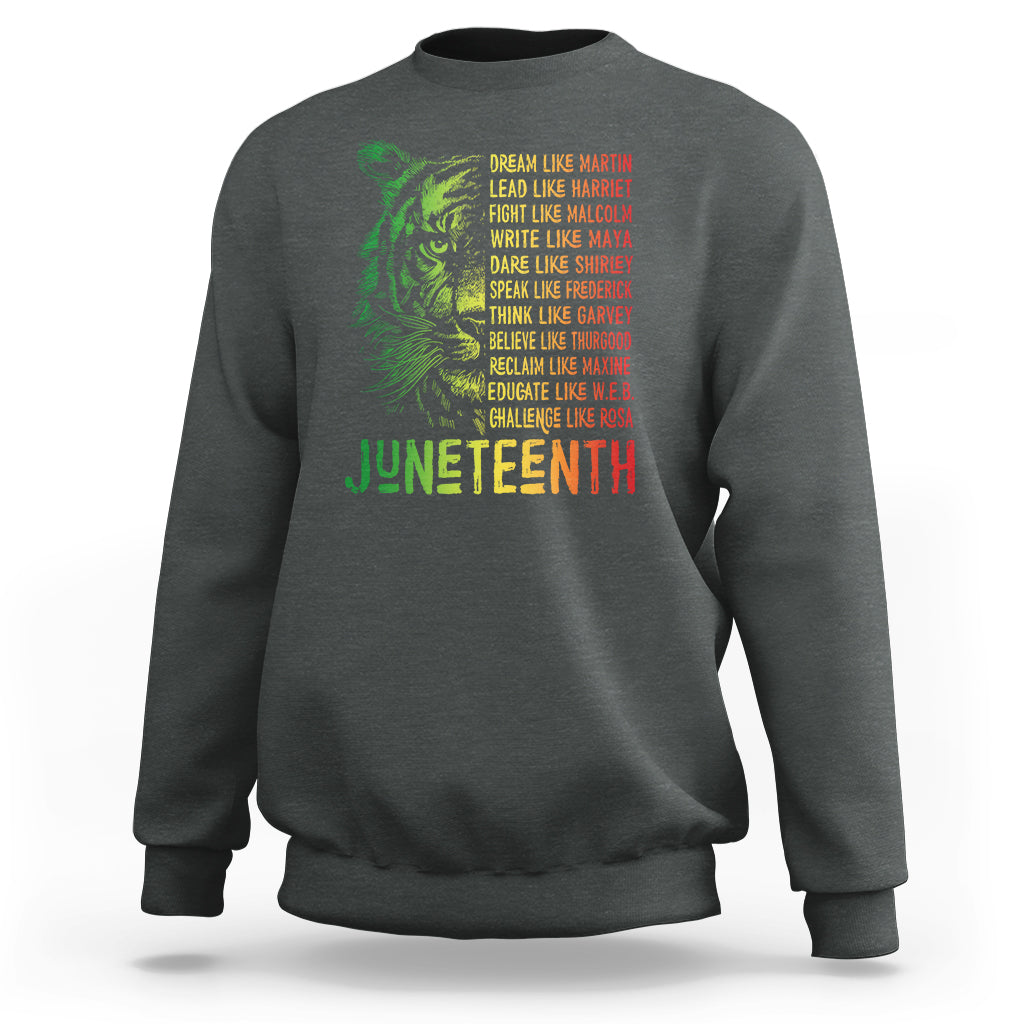 Juneteenth sweatshirt in charcoal gray with green lion graphic and “Juneteenth” text