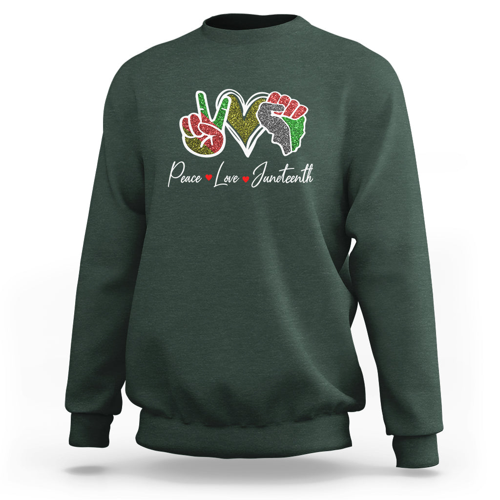 Dark forest green Juneteenth sweatshirt with colorful peace-love graphic on chest