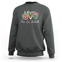 Light gray Juneteenth sweatshirt with colorful peace-love graphic on chest