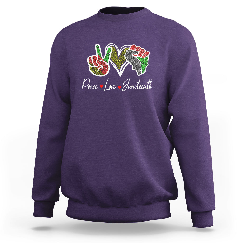 Purple Juneteenth sweatshirt with colorful peace-love graphic on chest