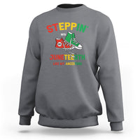 Light gray crewneck sweatshirt with colorful 'Steppin' Juneteenth sneaker graphic
