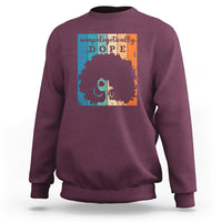Maroon crewneck sweatshirt with front graphic print