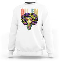 White crewneck sweatshirt with multicolor queen portrait graphic on front