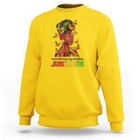 Yellow crewneck sweatshirt with front Juneteenth portrait graphic and colorful butterflies