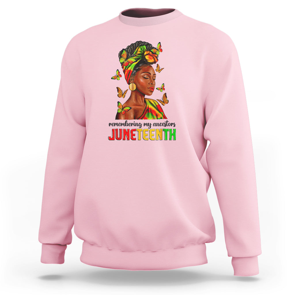 Light pink crewneck sweatshirt with front Juneteenth portrait graphic and colorful butterflies