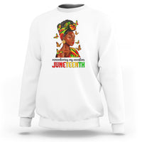 White crewneck sweatshirt with front Juneteenth portrait graphic and colorful butterflies