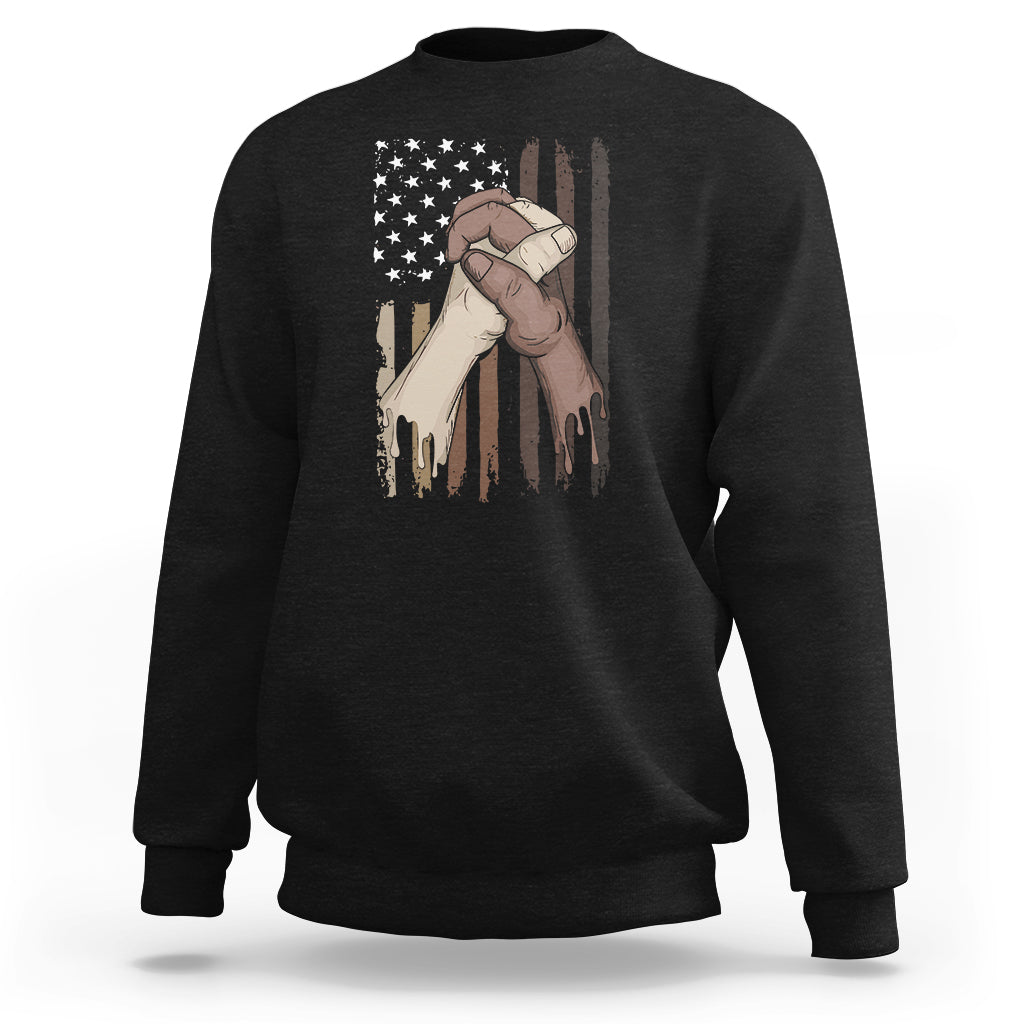 Black sweatshirt with US flag and hands graphic, crewneck long sleeves